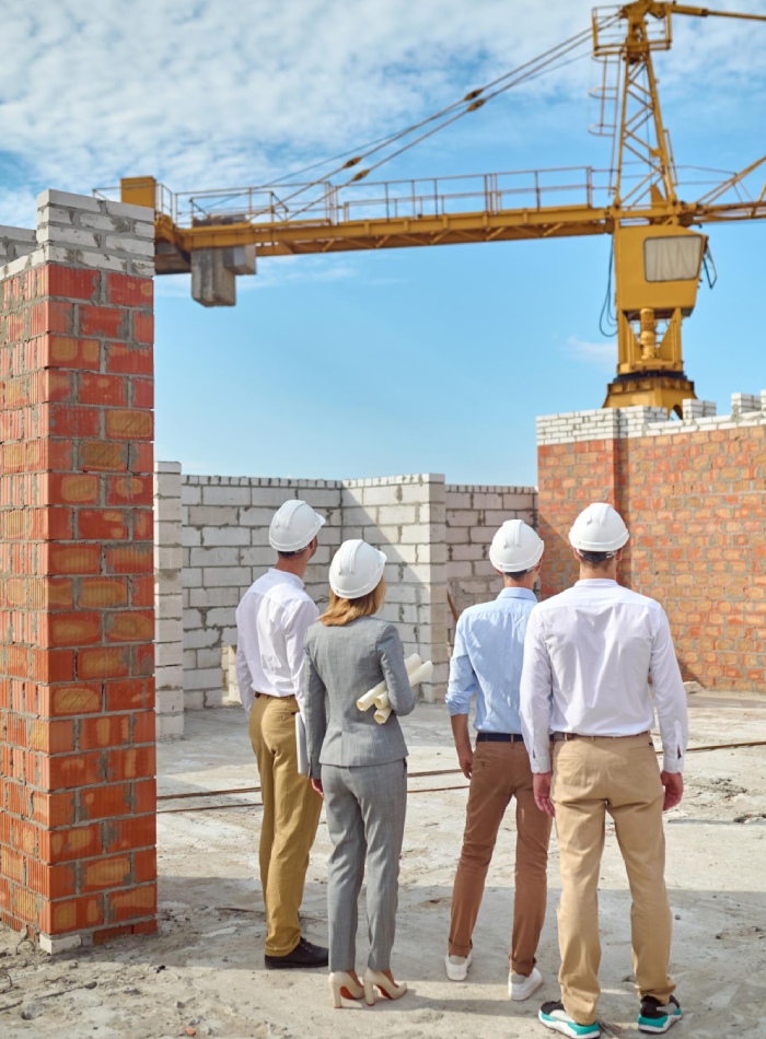 Équipe sur un chantier de construction et agrandissement de maison